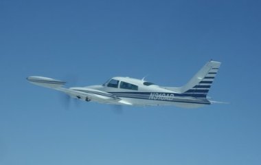 Steve Chang flying his Twin Cessna 310 in formation practice over Santa Maria in 2008. Photo by safety pilot MJ Butt.